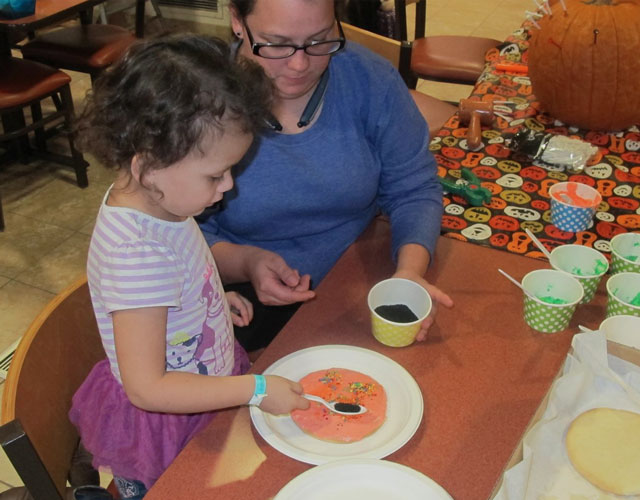 Dundee Bank making cookies with the kids at the Ronald McDonald house